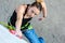 Beautiful female Climber moving up on vertical climbing Wall