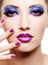 Beautiful female face with bright fashion make-up