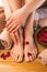 Beautiful female feet and hands, spa salon, pedicure and manicure procedure