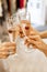 Beautiful female hands are holding glasses of champagne or rose wine. Close-up. Women clink glasses. New Years celebration, event