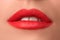Beautiful female lips close up. Red lipstick. Luxury makeup