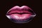 Beautiful female lips painted in pink on a black background