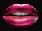 Beautiful female lips painted in pink on a black background