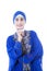 Beautiful female muslim in blue dress - isolated