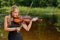 Beautiful female violin player - music series