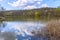 Beautiful fine, lovely, pretty, attractive forest lake among the mountains of the North Caucasus