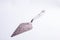 Beautiful and finely decorated silver cake knife on whi