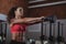 Beautiful fit crossfit woman exercising