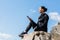 beautiful fit woman sitting on rocks