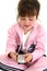 Beautiful Five Year Old Girl In Pink Workout Clothes With Cellphone