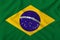 Beautiful flag of brazil on soft silk with soft folds in the wind