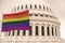 Beautiful flag of LGBT pride waving with the strong wind and behind it the dome of the Capitol USA 3D RENDER, 3D RENDERING LGBTQ,