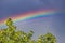 Beautiful flat rainbow in the sky close up