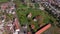 Beautiful flight on the quadcopter over the monastery in the city of Lorsch. Spring view of the Lorsch Monastery. Germany.