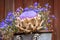 Beautiful floral arrangement with a dried, blooming artichoke