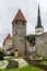 Beautiful flower beds along the ancient medieval walls of the Old Town of Tallinn, Estonia