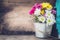 Beautiful flower bouquet in metal pots.