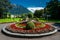 Beautiful flowerbed with flowers on a background of alpine mountains. Interlaken, Switzerland