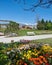 Beautiful flowerbed in park with amazing mountains in background.