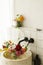 Beautiful flowers bouquet in modern marble sink in stylish bathroom. Summer flowers arrangement gathered from garden in modern