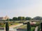 Beautiful flowers and trees near a water fountain in Mughal Gardens, India