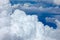 Beautiful fluffy clouds in blue sky, cumulus background