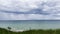 Beautiful fluffy clouds in the stormy sky over the lake Michigan