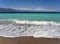 Beautiful foamy waves on the beach Psatha in the Corinthian Gulf and the Ionian sea in Greece