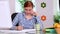 Beautiful focused brunette working on desk