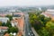 Beautiful foggy Vilnius city scene in autumn with orange and yellow foliage. Aerial early morning view