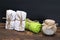 Beautiful folded towels for the Spa and salt in a jar on the table