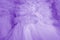 Beautiful folds of transparent violet fabric.