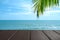 Beautiful foreground wooden floor and blue sea and sky background