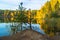 Beautiful forest lake old quarry on a clear autumn day