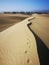 Beautiful formations of a sand dunes and the foot track in the sand, Maspalomas, Gran Canaria Island, Spain