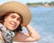 Beautiful forty year old woman with straw hat