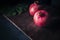 Beautiful fresh red pomegranates and a tropical leaf with a dark background.Beautiful ripe pomegranates and ready to eat.