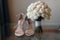 Beautiful fresh wedding bouquet with bride`s shoes