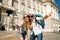 Beautiful friends tourist couple visiting Spain in holidays students exchange taking selfie picture