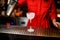 Beautiful frozen empty transparent glass on long leg stands on the bar