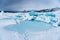 Beautiful frozen pond / tarn  surrounded by unique ice formations and caves in Matanuska Glacier, Alaska.