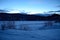 Beautiful frozen river and mountain landscape in the high north