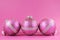 Beautiful fuchsia pink festive bauble ornaments