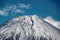Beautiful Fuji mountain in Japan. Close zoom detail of top covered with snow.