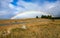 Beautiful full double rainbow over road