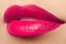 Beautiful full pink lips. Pink lipstick. Make-up and cosmetics