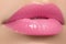 Beautiful full pink lips and white teeth. Pink lipstick. Gloss lips. Make-up