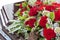 Beautiful funeral wreath of roses on a coffin, close-up