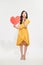 Beautiful funky lady send air kisses hands arms hold pretty sweet large heart shaped figure postcard on bright color background