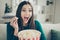 Beautiful funny joking crazy mad emotion expressing she her lady holding hugging large big bucket with popcorn enjoying